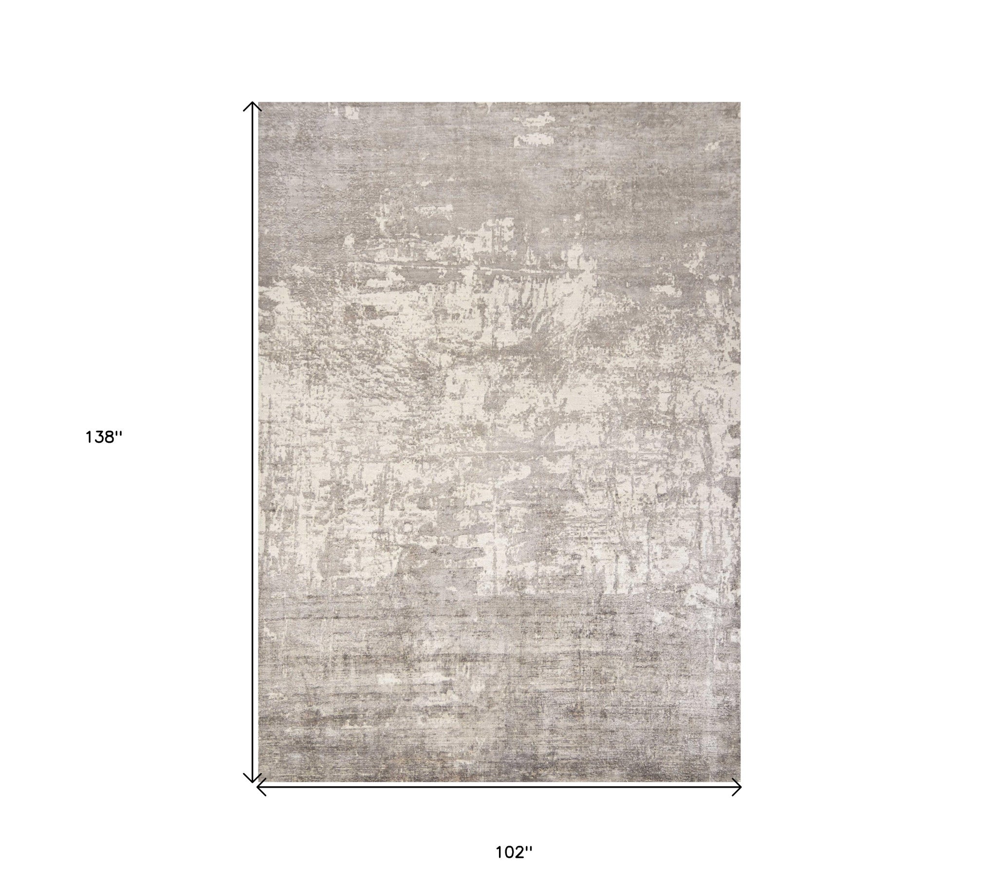 8' x 11' Beige Abstract Hand Loomed Area Rug