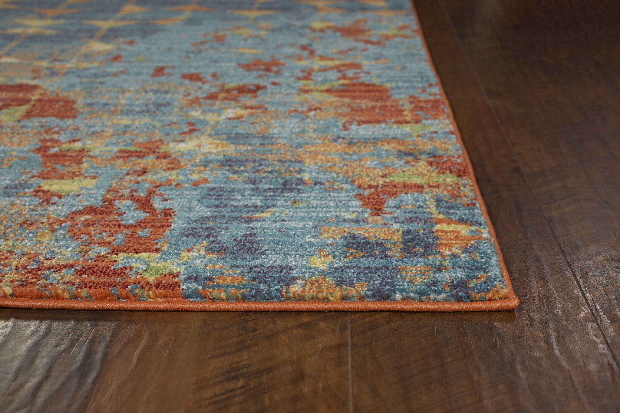 7'X10' Blue Coral Machine Woven Abstract Triangular Strings Indoor Area Rug