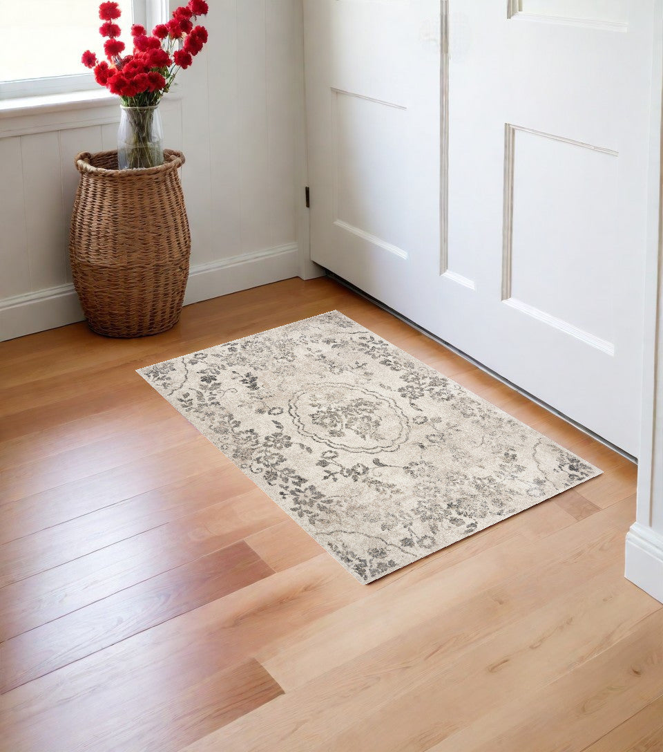 5'X8' Grey Machine Woven Distressed Floral Medallion Indoor Area Rug